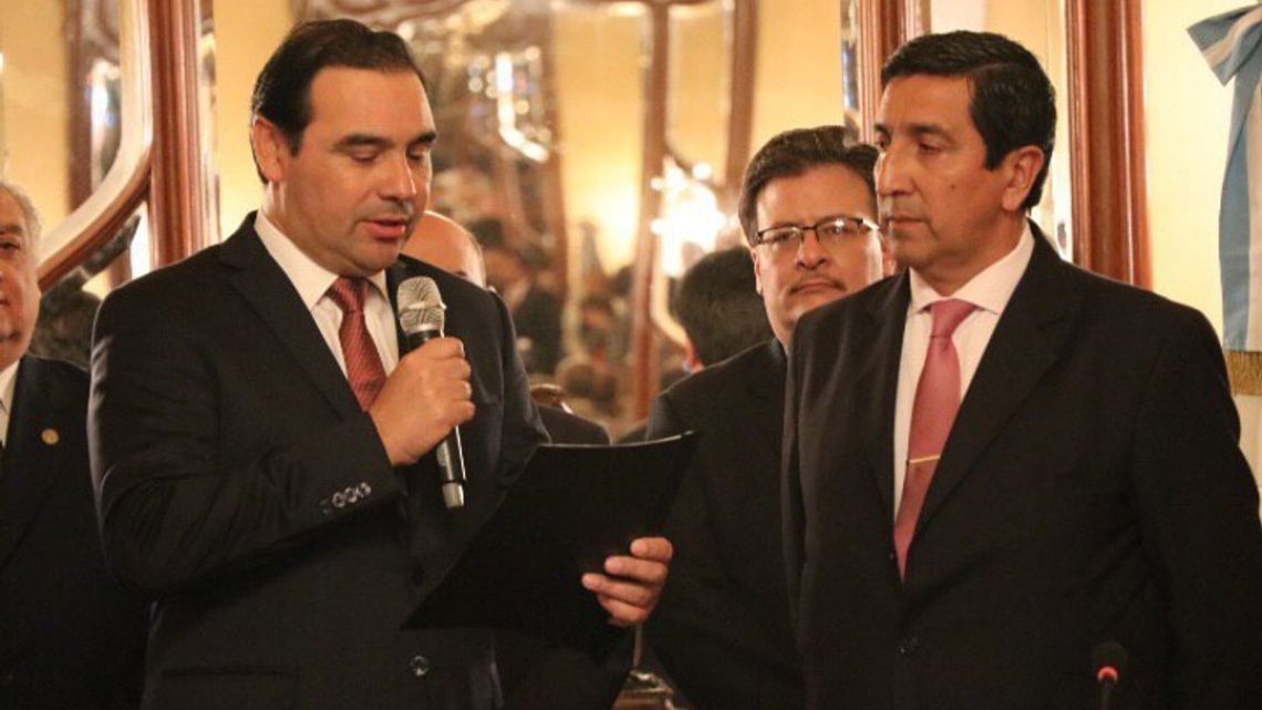 Corrientes Province Governor Gustavo Valdés and outgoing provincial Security Minister Buenaventura Duarte.