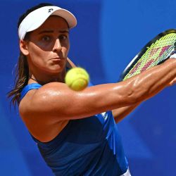 La argentina Maria Lourdes Carle durante su partido de tenis de segunda ronda de individuales femeninos en el Estadio Roland-Garros en los Juegos Olímpicos de París. Foto de Miguel MEDINA / AFP | Foto:AFP