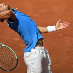 El italiano Lorenzo Musetti durante su partido de cuartos de final de tenis individual masculino en el Estadio Roland-Garros durante los Juegos Olímpicos de París. Foto de PATRICIA DE MELO MOREIRA / AFP | Foto:AFP