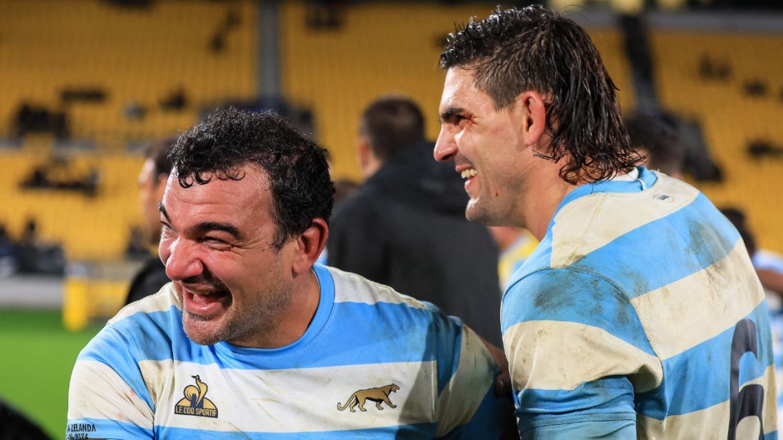 Argentina's Agustín Creevy (left) and Pablo Matera celebrate their team's victory in the Rugby Championship match between New Zealand and Argentina at Sky Stadium in Wellington on August 10, 2024. 