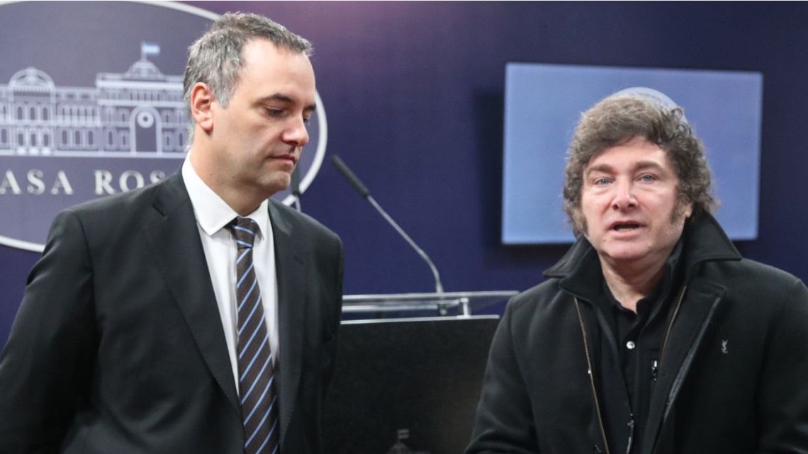 Presidential spokesperson Manuel Adorni and President Javier Milei at the Casa Rosada.