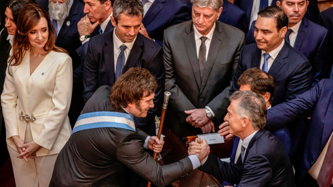 President Javier Milei shakes hands with Maurico Macri during his inauguration ceremony in Buenos Aires on December. 10, 2023.