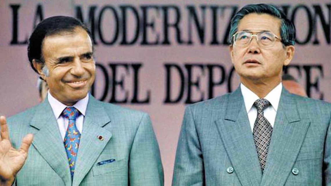 Argentina's then-president Carlos Menem poses for a photograph with Peru's then-president Alberto Fujimori.