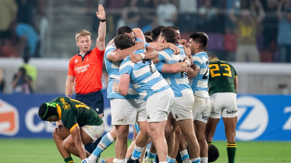 Argentine players celebrate after winning the rugby union Championship match again South Africa