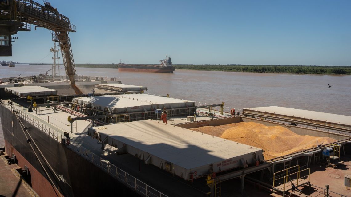 Soy is loaded onto a ship on the Parana River waterway in Rosario.