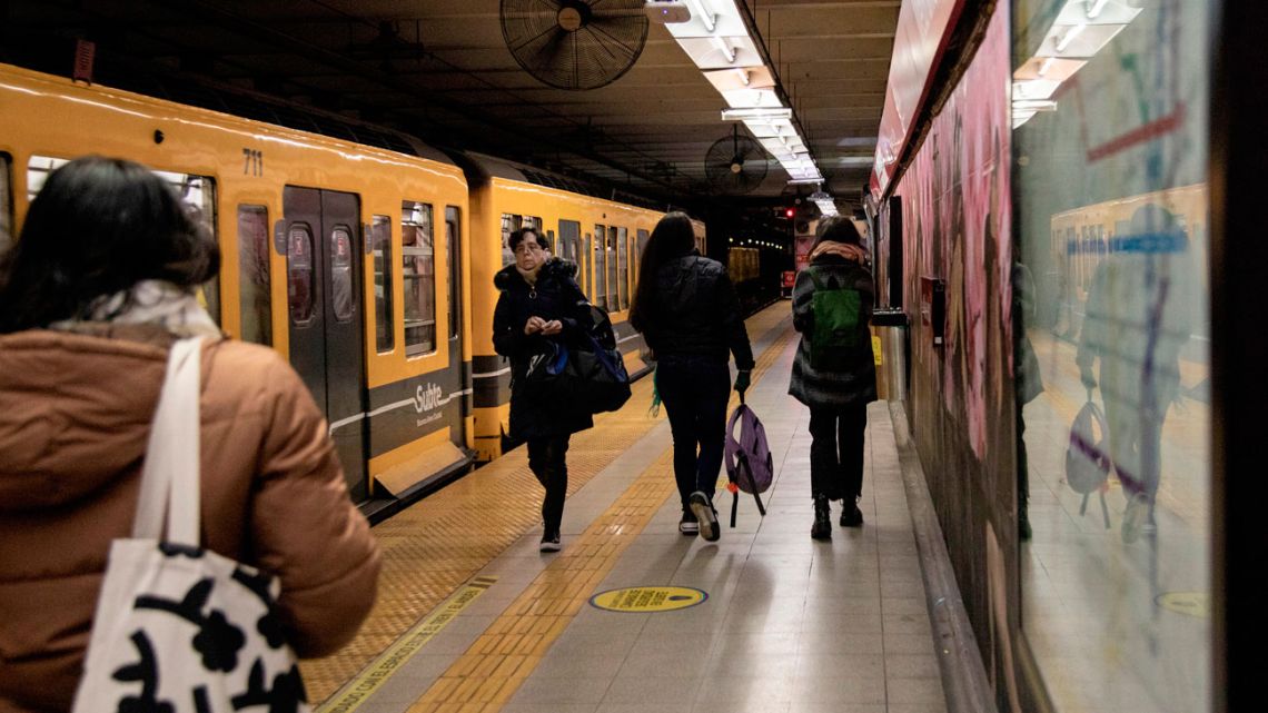 Commuters at a subway station in Buenos Aires.