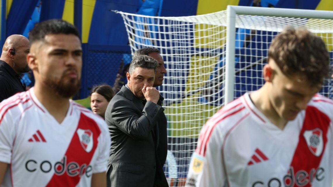 River Plate's head coach Marcelo Gallardo covers his nose after the 2024 Argentine Professional Football League tournament match between Boca Juniors and River Plate at the Alberto Jose Armando 'La Bombonera' stadium, in Buenos Aires on September 21, 2024. 