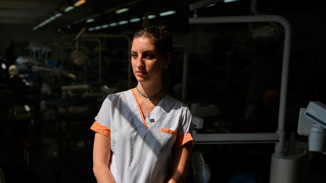 Ornella Sol Fritzler, a dental student, poses for a photo during an interview with AFP in Buenos Aires on September 18, 2024. 