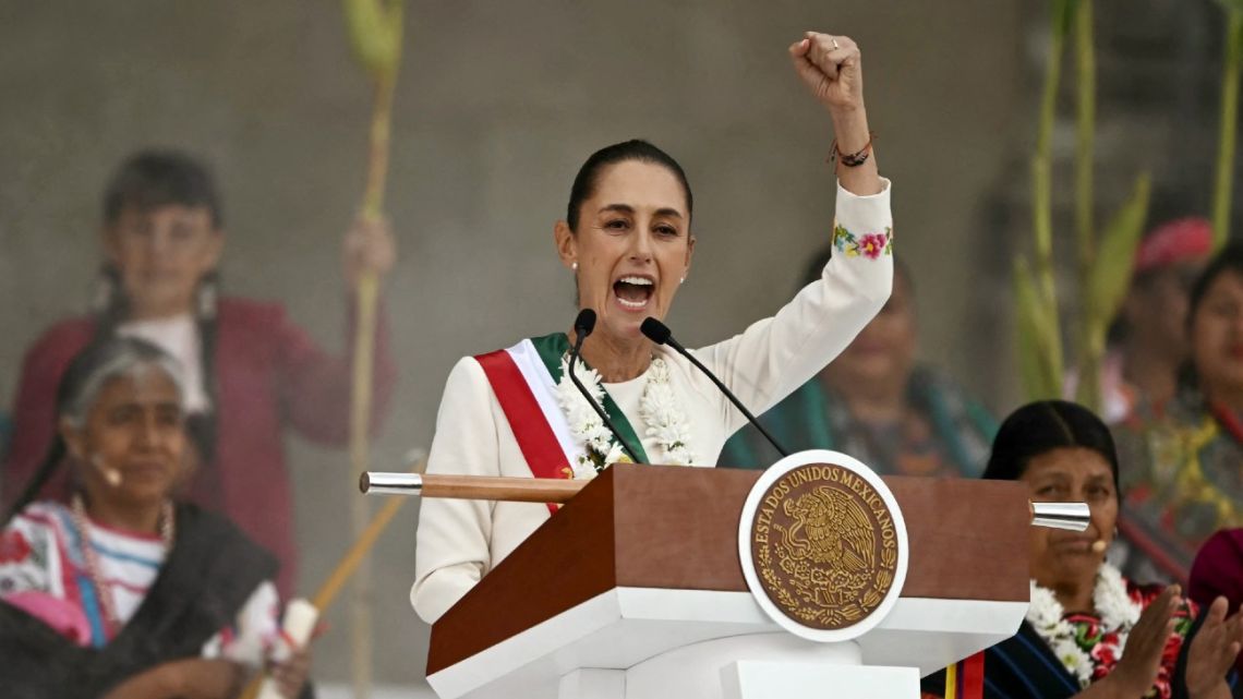 Mexico's new President Claudia Sheinbaum delivers a speech after receiving a ceremonial staff from indigenous peoples at the Zocalo Square in Mexico City on October 1, 2024. 