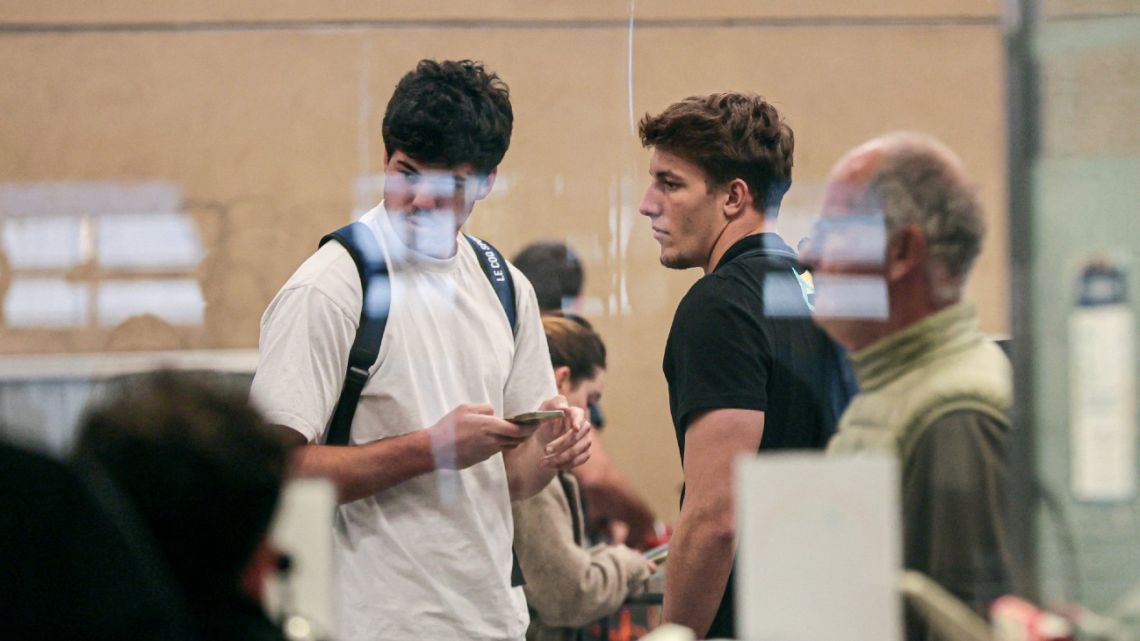 French rugby players Hugo Auradou and Oscar Jégou are pictured at the Aeroparque Jorge Newbery Airport in Buenos Aires on August 27, 2024. 