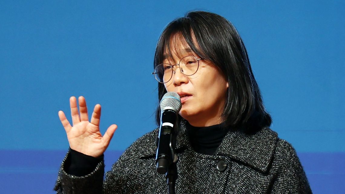 This undated photo released by Yonhap news agency on October 10, 2024 shows South Korean author Han Kang delivering a speech at a lecture in Gwangju.