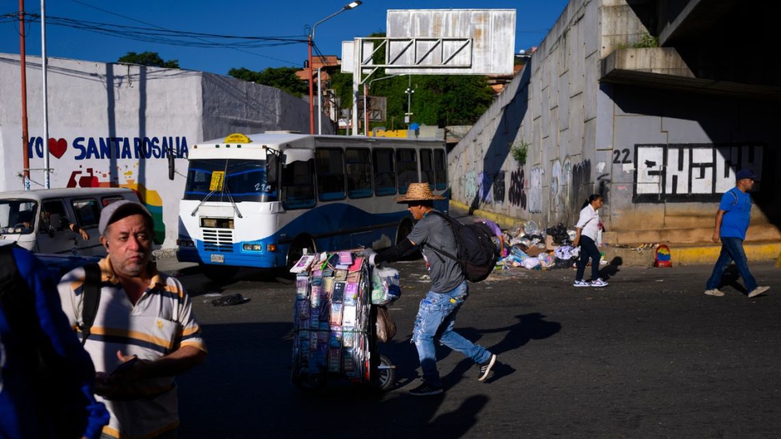 Pedestrians in dowtown Caracas, Venezuela, on Wednesday, Sept. 11, 2024. 