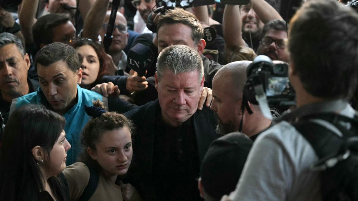 Geoff Payne (C), the father of One Direction pop singer Liam Payne, arrives to the CasaSur Hotel in Buenos Aires on October 18, 2022.