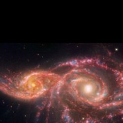 Los colores macabros de esta pareja representan una combinación de luz del infrarrojo medio proveniente del telescopio espacial James Webb de la NASA con luz visible y ultravioleta del telescopio espacial Hubble de la NASA.