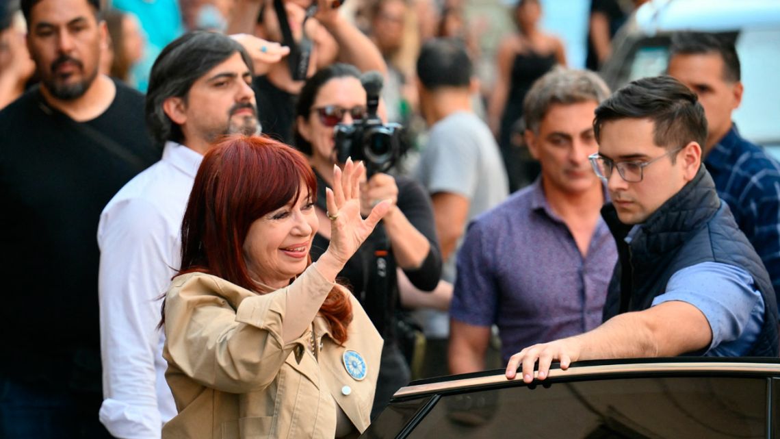 Former president Cristina Fernández de Kirchner greets her supporters upon arrival at the Instituto Patria in Buenos Aires on November 13, 2024, after a court upheld her conviction for corruption. 