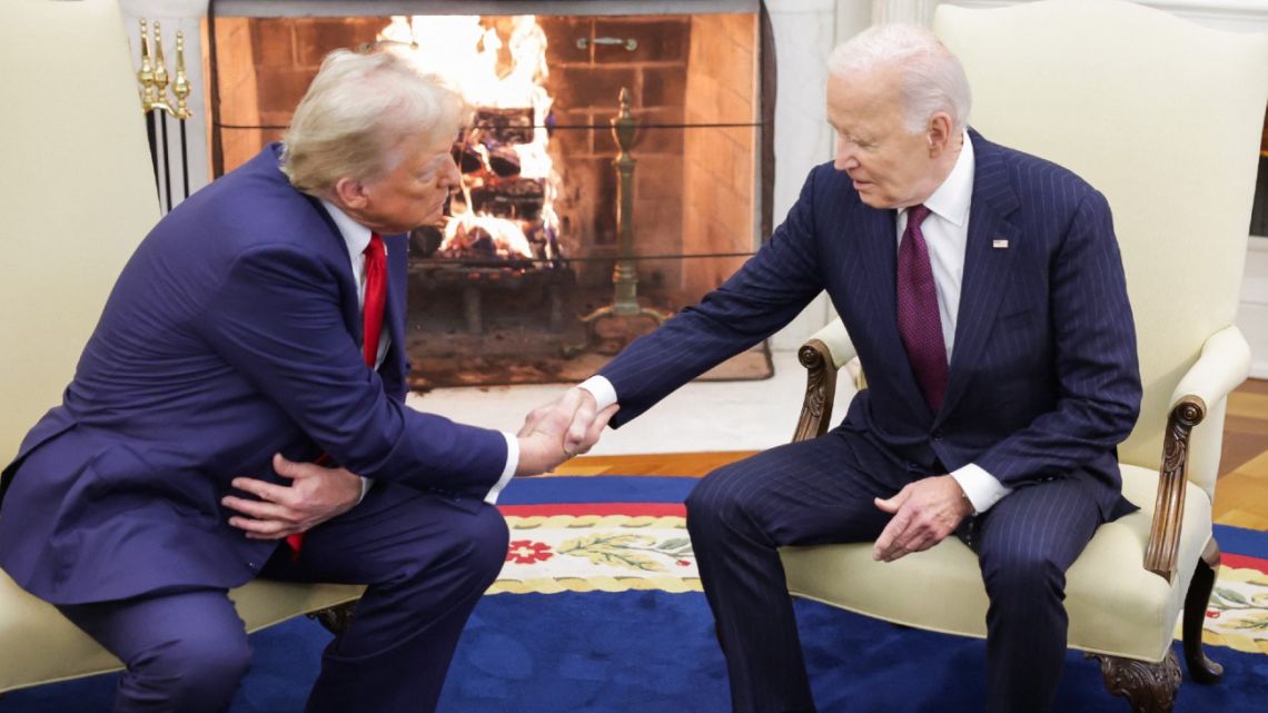 U.S. President Joe Biden shakes hands with U.S. President-elect Donald Trump in the Oval Office of the White House on November 13, 2024 in Washington, DC. 