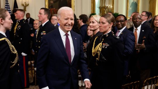 U.S. President Joe Biden leaves the East Room after addressing the Classroom to Career Summit