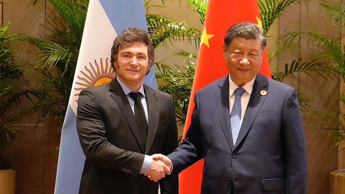 Handout picture released by the Presidency showing Argentina's President Javier Milei shaking hands with China's President Xi Jinping during a bilateral meeting on the sidelines of the G20 summit in Rio de Janeiro, Brazil, on November 19, 2024. 