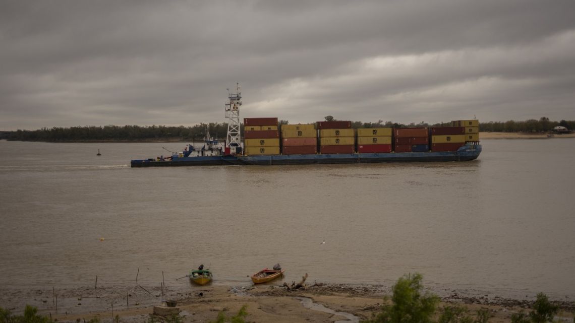 A cargo ship travels on the Paraná River during low water levels in Rosario, Argentina.