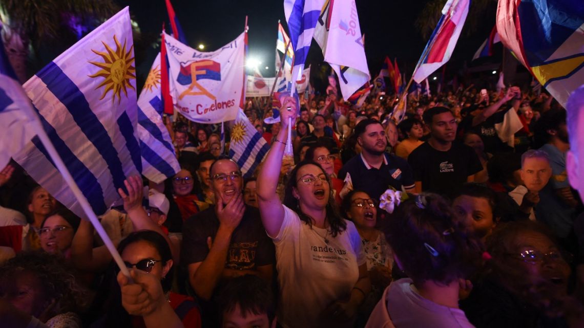 Supporters of Uruguay's presidential candidate for the Frente Amplio coalition, Yamandú Orsi, attend his campaign closing rally in Las Piedras, Canelones Department, Uruguay, on November 20, 2024. 