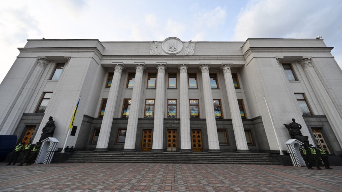 National Guard servicemen stand guard outside the Ukrainian Parliament.