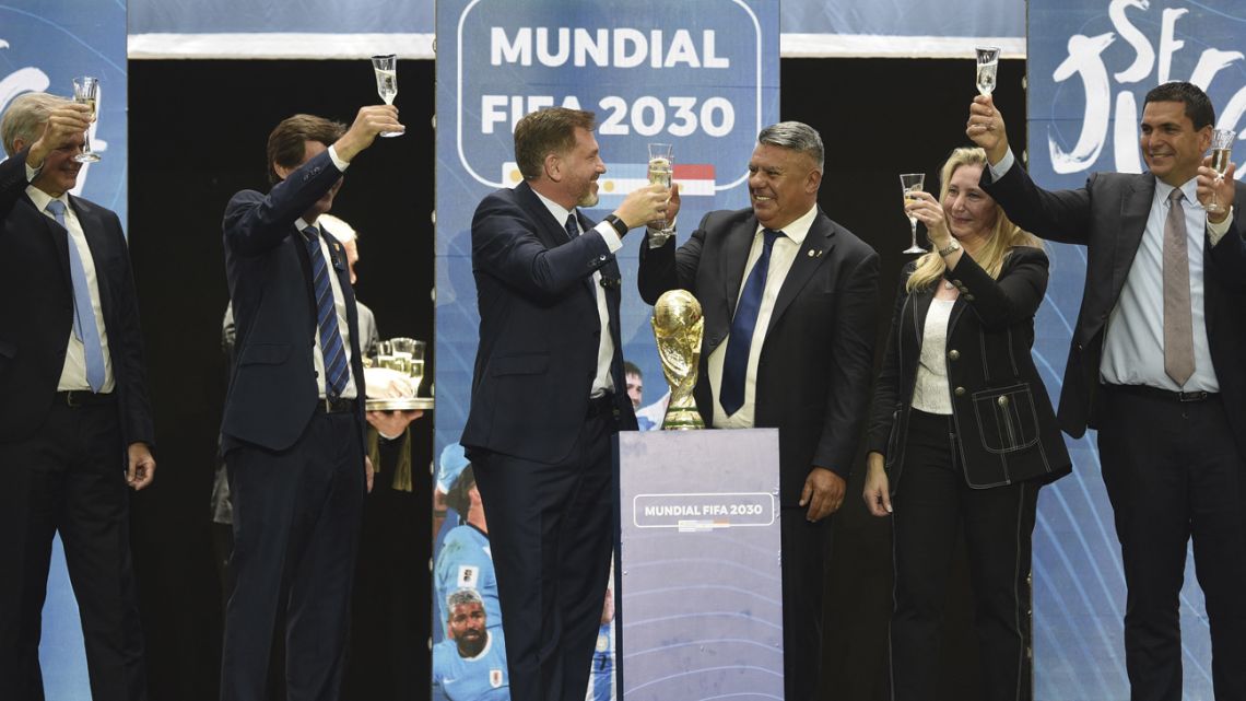 All smiles at CONMEBOL for 2030 World Cup decision.