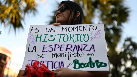 A woman participates in a demonstration to celebrate the ruling of the Inter-American Court of Human Rights