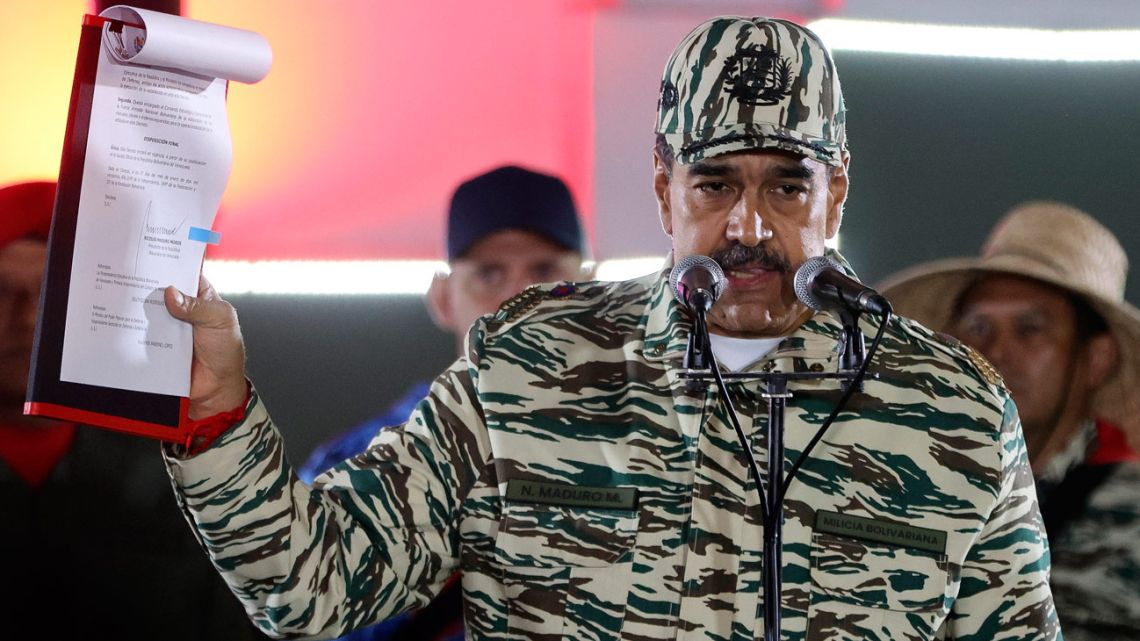 Venezuelan President Nicolás Maduro gestures as he speaks during a swearing-in march for combatant forces in Caracas on January 7, 2025. 