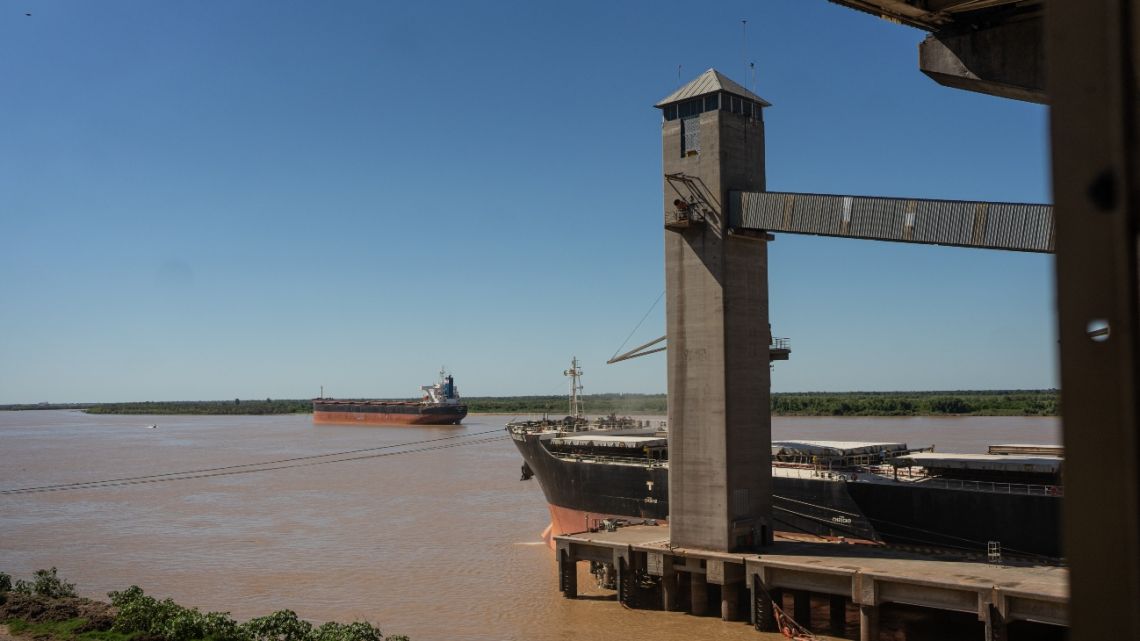 Soy is loaded onto a ship along the Paraná River at a processing facility in Rosario on March 26, 2024. 