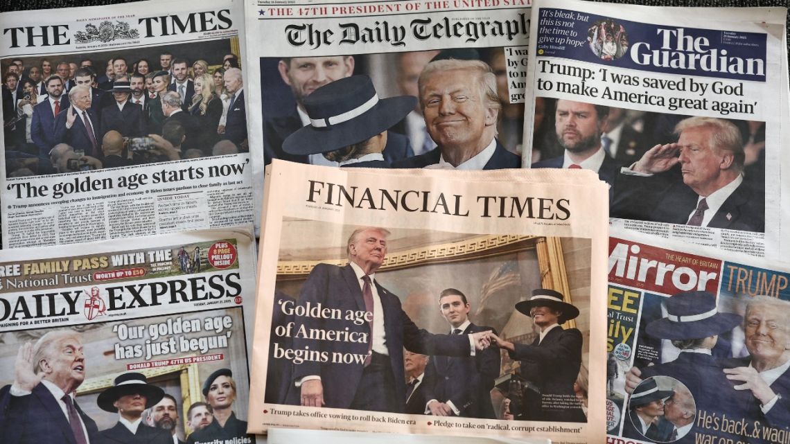 A photo illustration shows the front pages of some of Britain's national newspapers, dominated by the inauguration of Donald Trump as the 47th President of the United States of America, in London on January 21, 2025. 