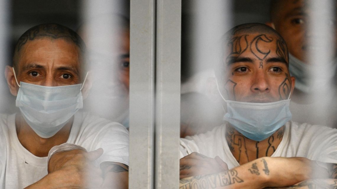 Inmates look on as they remain in a cell at the Counter-Terrorism Confinement Centre (CECOT) mega-prison, where hundreds of members of the MS-13 and 18 Street gangs are being held, in Tecoluca, El Salvador on January 27, 2025.