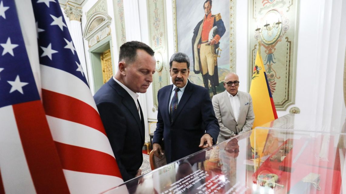 Handout picture released by Venezuela's Presidency shows Venezuela's president Nicolás Maduro speaking with US President Donald Trump's special envoy Richard Grenell at Miraflores presidential palace in Caracas on January 31, 2025.