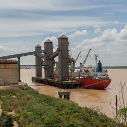 A ship loads soy at a port on the Paraná River in Rosario. 