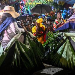 Afrocolombianos actúan durante las celebraciones de las "Adoraciones al Niño Dios" en Quinamayo, departamento del Valle del Cauca, Colombia. Las "Adoraciones al Niño Dios" son celebraciones navideñas tradicionales de las comunidades afrocolombianas que se llevan a cabo en febrero desde hace unos 145 años. | Foto:JOAQUIN SARMIENTO / AFP
