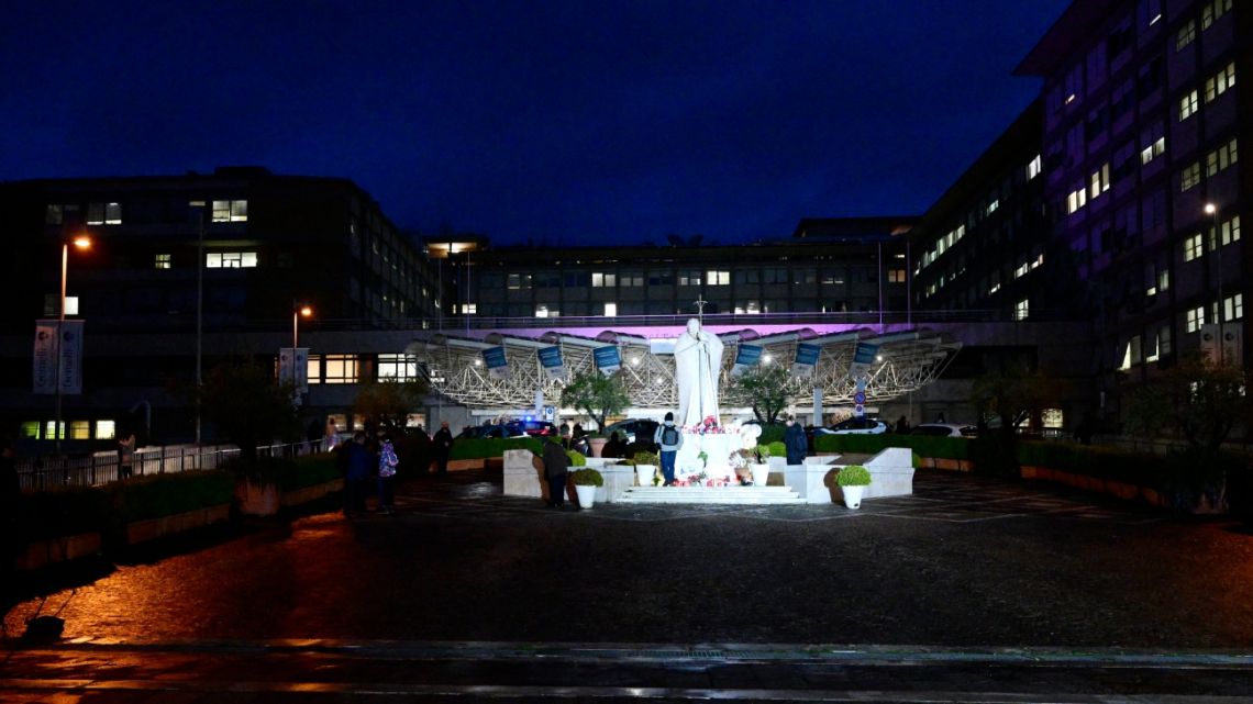 A picture shows the statue of John Paul II outside the Gemelli hospital where Pope Francis is hospitalised in Rome on February 24, 2025.