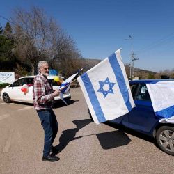 Los residentes israelíes del kibutz Yiftah, que fueron desplazados debido a los combates transfronterizos entre Israel y el Hezbolá libanés, celebran su regreso a sus hogares. Foto de Jalaa MAREY / AFP | Foto:AFP