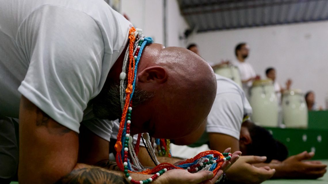 Umbanda practitioners perform a ritual in honor of the Caboclo entity at the Centro Espírita Umbandista Caboclo Sete Estrelas in the Realengo neighbourhood of Rio de Janeiro, Brazil, on February 22, 2025.