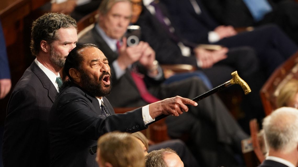 US Democrat Representative of Texas Al Green (L) disrupts US President Donald Trump as he spoke to a joint session of Congress at the US Capitol in Washington, DC, on March 4, 2025.