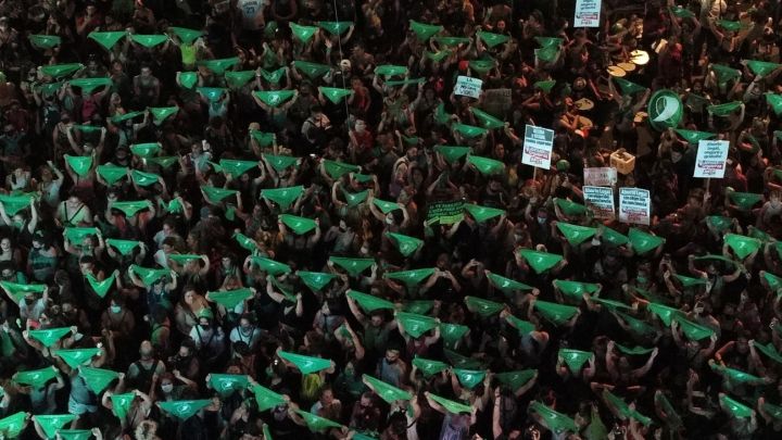 Aerial view showing demonstrators displaying green headscarfs -- symbol of abortion rights activists -- outside the Argentine Congress in Buenos Aires, on December 10, 2020, as legislators debated a bill to legalise abortion.