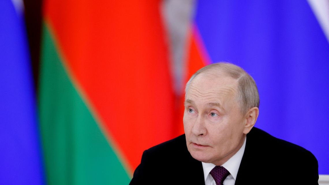 Russia's President Vladimir Putin attends a press conference following a meeting with his Belarusian counterpart at the Kremlin in Moscow on March 13, 2025.