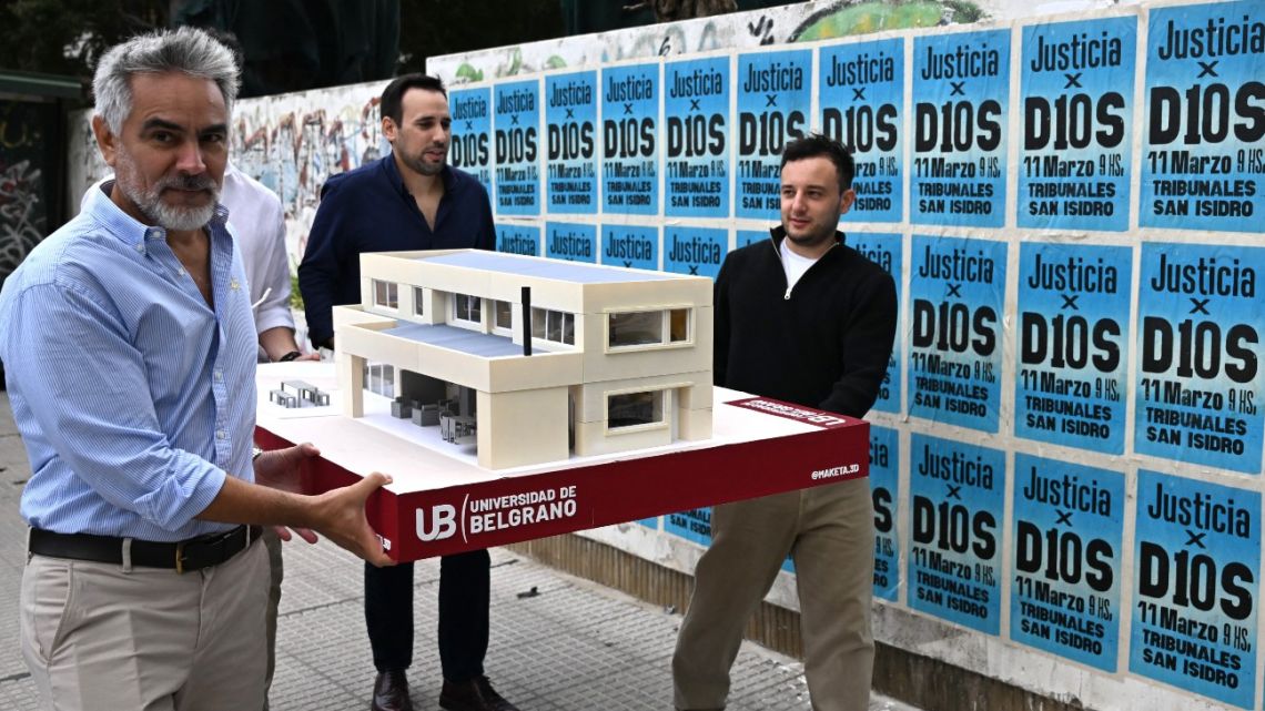 A model of the house where late Argentine football legend Diego Maradona died is seen arriving to the trial for his death at court in San Isidro, Buenos Aires Province, on March 11, 2025. 