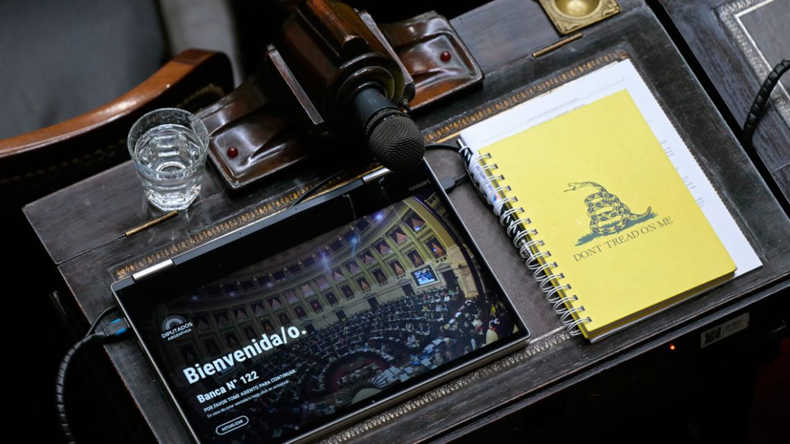 View of a seat of a lawmaker from the ruling La Libertad Avanza ruling party during the debate on a decree by Argentina's President Javier Milei to obtain congressional backing for the signing of new debt with the International Monetary Fund (IMF) at the Chamber of Deputies in Buenos Aires on March 19, 2025. 