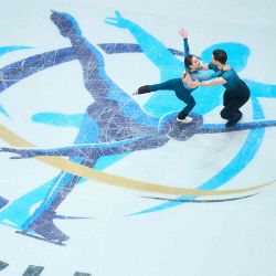 Patinaje artístico Deanna Stellato-Dudek y Maxime Deschamps practican durante el inicio del Campeonato Mundial de Patinaje Artístico ISU. Foto de GEOFF ROBINS / AFP | Foto:AFP