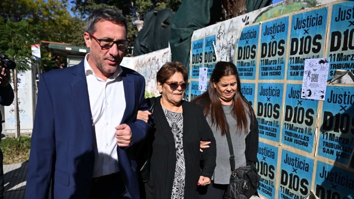 Ana Estela (centre) and Claudia Maradona, sisters of Diego Maradona, arrive at a San Isidro court to attend a trial hearing for the death of their brother in San Isidro, Buenos Aires province on April 3, 2025. 