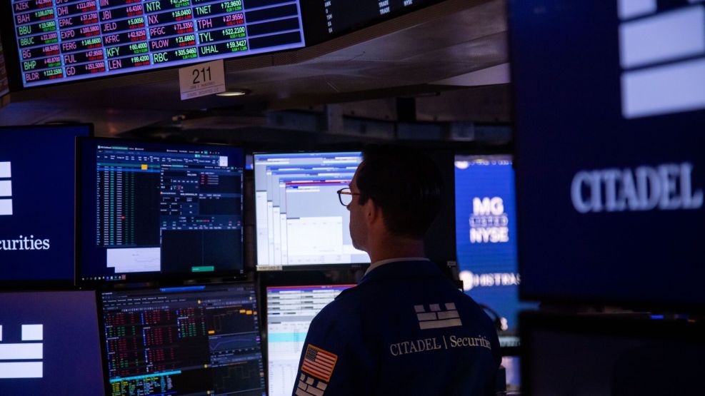 Traders On The Floor Of The NYSE As US Stock Futures Trade Near Bear Market With China Retaliation