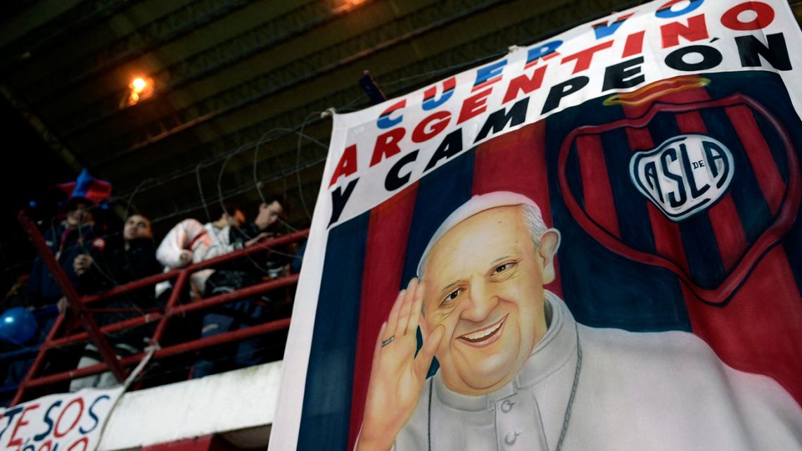 A banner with the image of Pope Francis hangs from a stand at Pedro Bidegain stadium in Buenos Aires, Argentina,