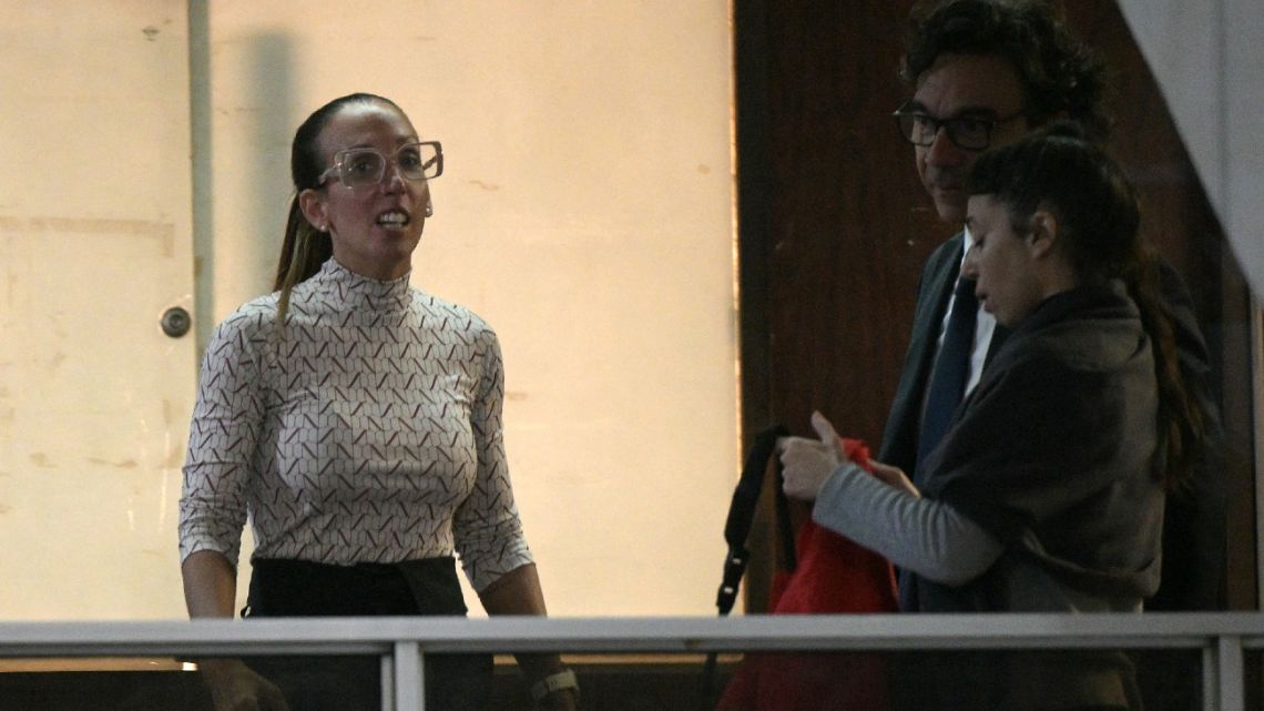 Psychiatrist Agustina Cosachov (right) and her lawyer Vadim Mischanchuk (L) walk inside the court during a trial hearing on the late Argentine football legend Diego Maradona's death in San Isidro, Buenos Aires province, on May 6, 2025. 