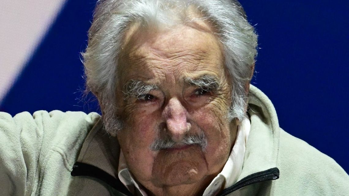 Former Uruguay president (2010-2015) Jose 'Pepe' Mujica waves to supporters at the closing campaign rally of his political sector, part of the Frente Amplio party in Montevideo on October 19, 2024. 