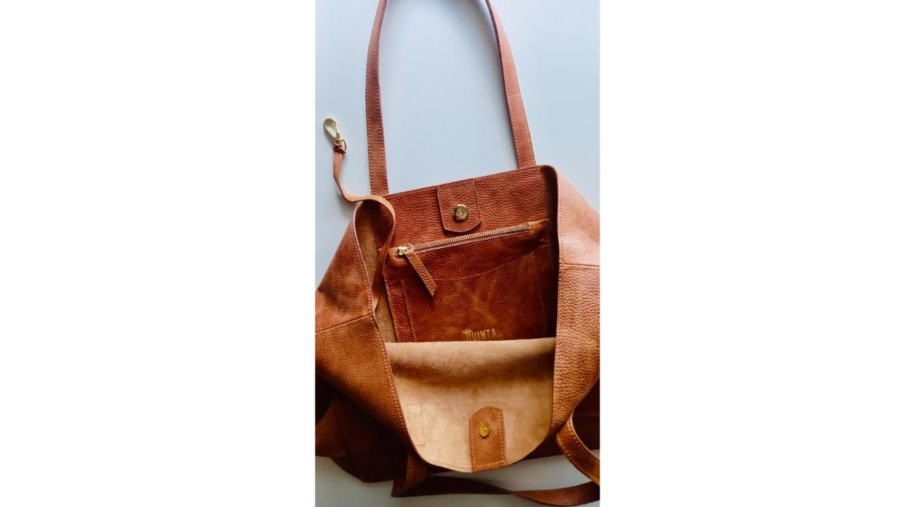 Quinta: Carteras de cuero artesanales con estilo y durabilidad