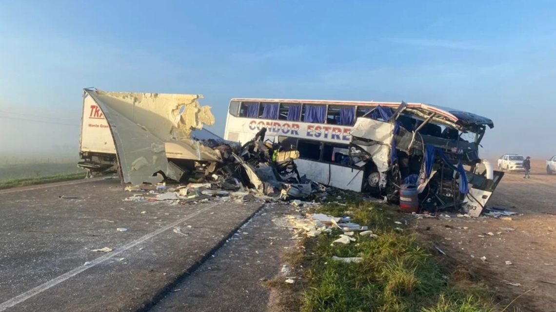 At least four people were killed and 15 injured on Tuesday in a head-on collision between a bus and a lorry on a road in the centre of Buenos Aires Province, medical sources reported.